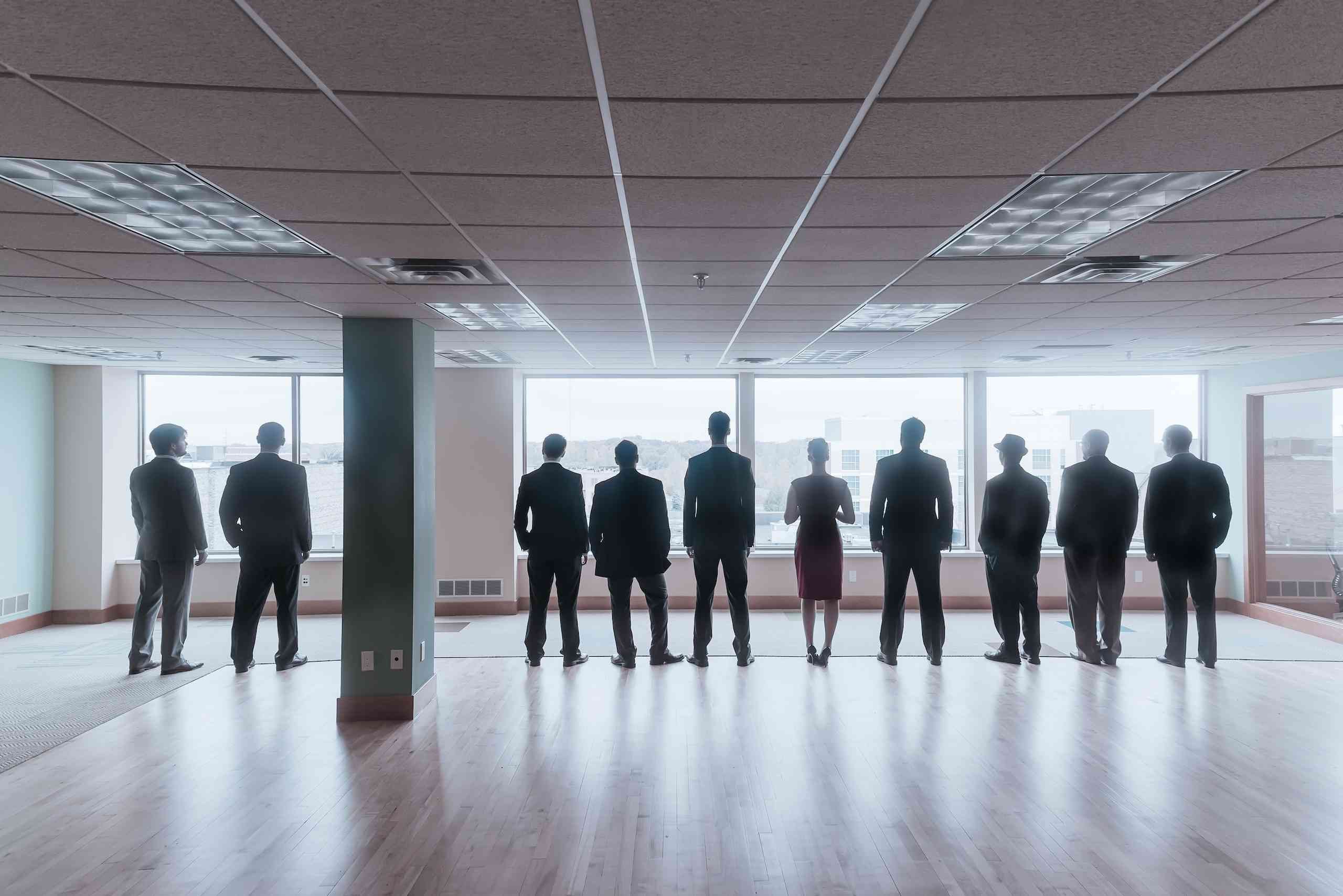 The team in our Mad Men pose