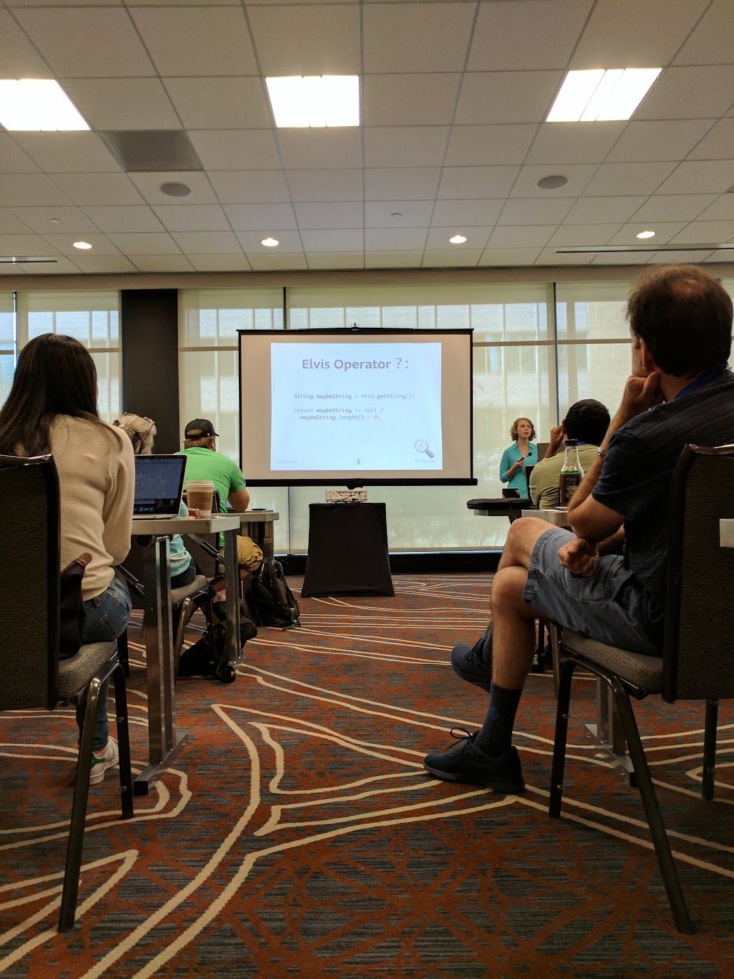 Victoria Gonda explaining the Elvis Operator in her talk "Kotlin: Uncovered"